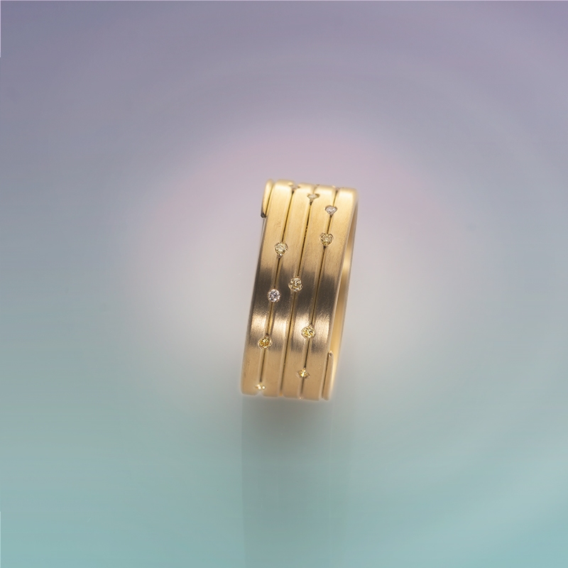 Ribbon Eternity Ring- Fairtrade Gold with diamonds by Cox and Power Jewellers London
