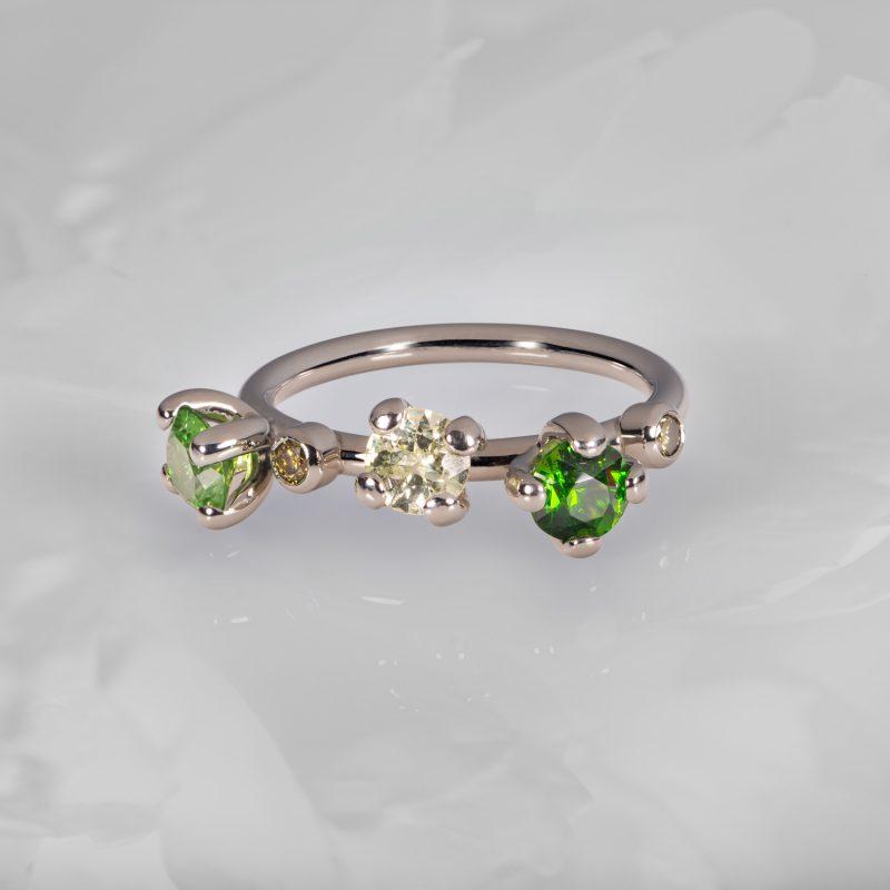 Green Demantoid Garnet, Diamond and Yellow Sapphire Peony ring in Platinum - by Cox & Power jewellers