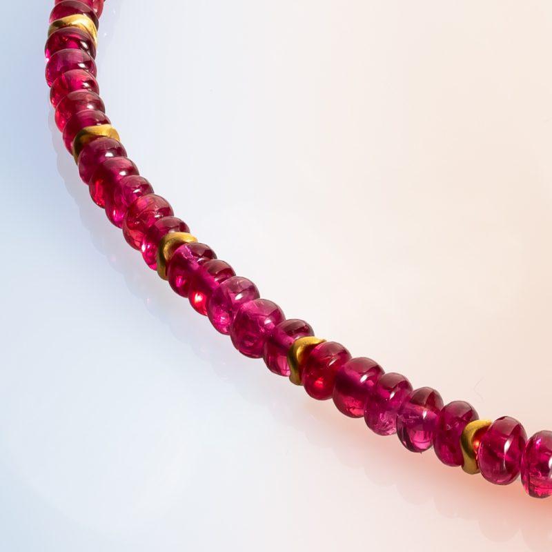 Red Spinel bead collar with gold beads Detail by Cox and Power jewellery London