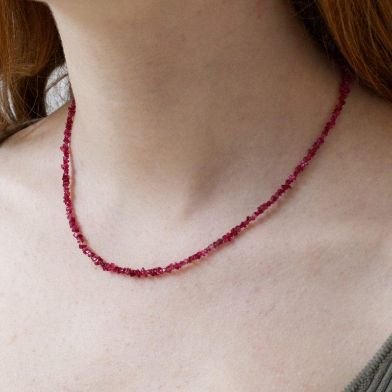 Fine Spinel Chip Bead Necklace with Clip Clasp in 18ct Yellow Gold shown on model's neck.
