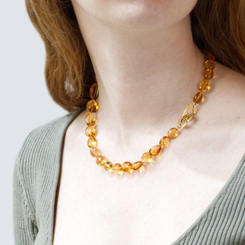Citrine Pebble Necklace with Large C clasp 18ct gold, shown on model's neck.