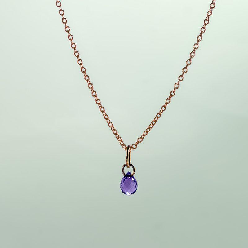 Faceted amethyst briolette pendant with 18ct yellow gold bail on a fine trace chain