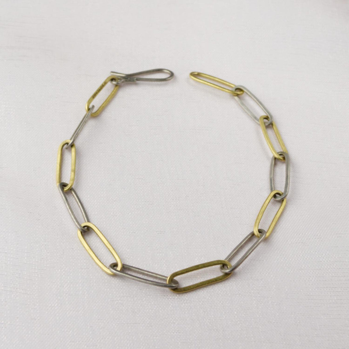 Fine Forged Link Bracelet in 18ct Yellow Fairtrade Gold and Platinum image 0