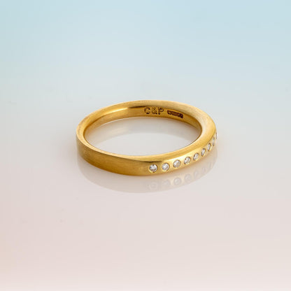 side view of 18ct yellow gold eternity Ring with 11 Diamonds