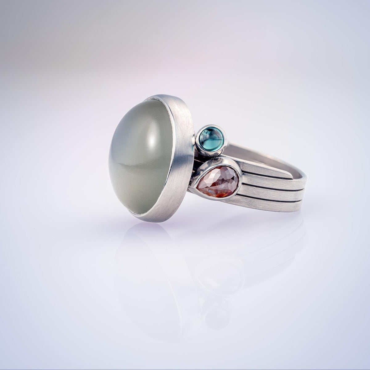 Lunar Ring with Moonstone, Diamond and Green Tourmaline in Fairtrade and Fairmined Platinum